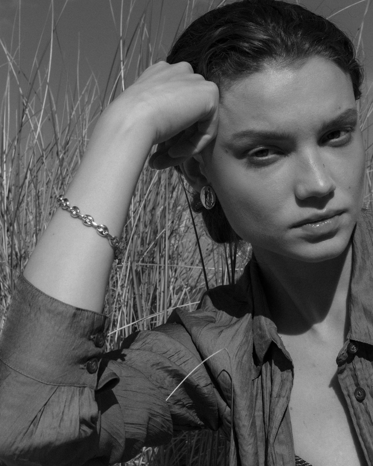 silver bracelet, silver earrings, statement earrings