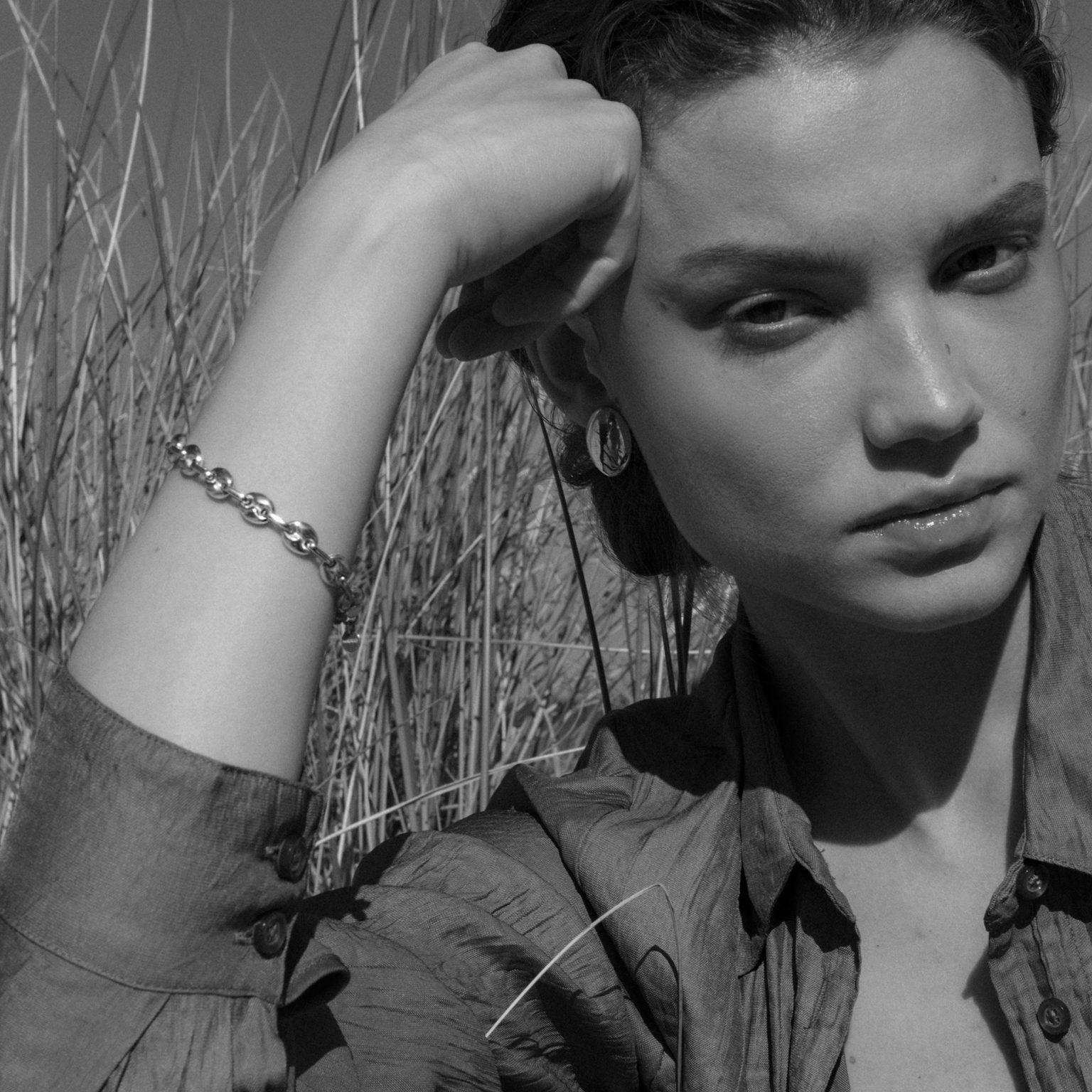 silver bracelet, silver earrings, statement earrings