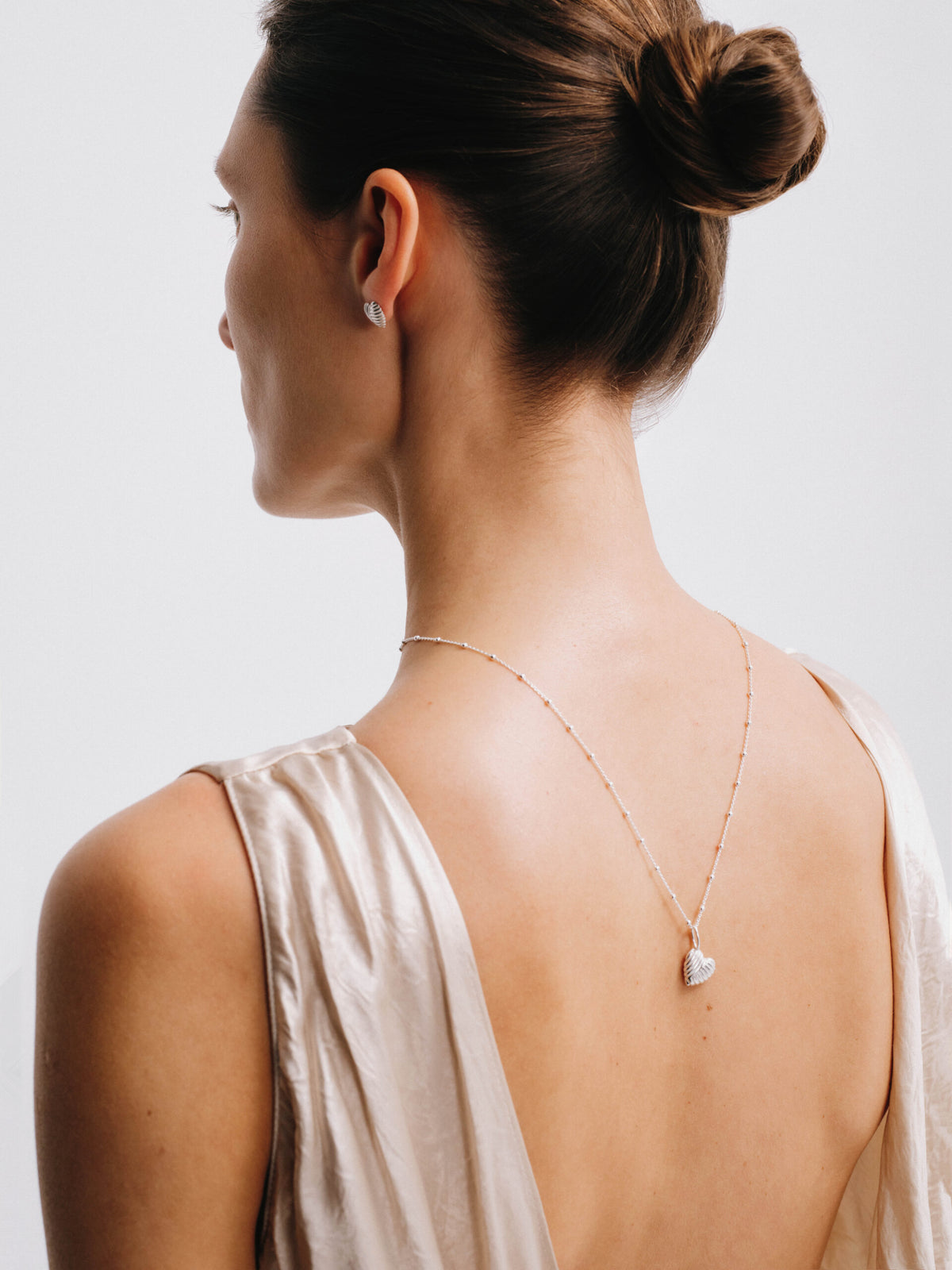 silver heart shaped necklace